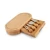 Import Oval Slide Out Bamboo Cheese Board and 4 Piece Knife Set from China