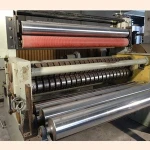 Paper machine for making perforated underlay kraft paper in apparel factory
