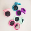 The new folding circular mirror Mini Rainbow plastic comb is available for high-end outdoors cosmetic bags