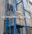 Import vertical lead rail goods lift industrial hydraulic lift for warehouse from China