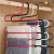 Import white S type metal wire pants hanger rack for pants storage from China
