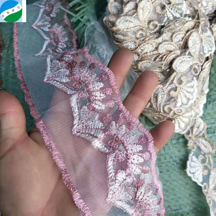 Beautiful design polyester mesh embroidery stock fabric