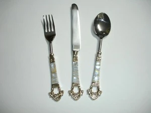 Brass embossed cutlery flatware set