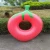 Import Custom and wholesale PVC strawberry inflatable adult swimming rings and swim rings float from China