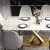 Import Dining Room Stainless Steel Modern Luxury Marble Top Dining Tables and Chairs Set from China
