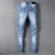 Import Fashion splash ink quality mens jeans dropshipping stock popular wholesale mens jeans from China