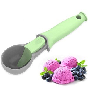 Ice cream spoon made of PS+TPR with soft touch handle,a spring set for releasing ice cream,fashional design,easy to clean