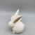 Import Premium rabbit decor flower plate shape white porcelain egg holder from China