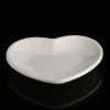 white plastic heart plates