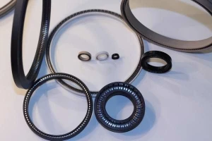 High performance polymer filled PTFE spring energized seal