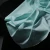 Import 100% cotton solid color blue color silk and smooth satin weave fabric for garment from China