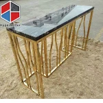 Black marble reception desk in gold