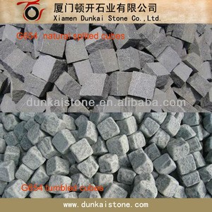 China cheap dark grey granite cobble stone, flamed granite paving stone