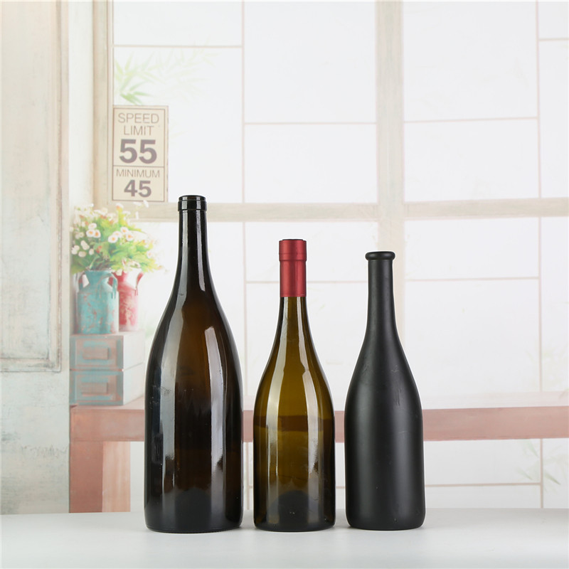 China manufacturer factory price empty liquor glass bottles 750ml red glass wine bottle burgundy wine bottle for sale