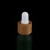 Import Custom 15ml Matt Green Colored Dropper Oil Bottle Serum Glass Dropper Bottle from China