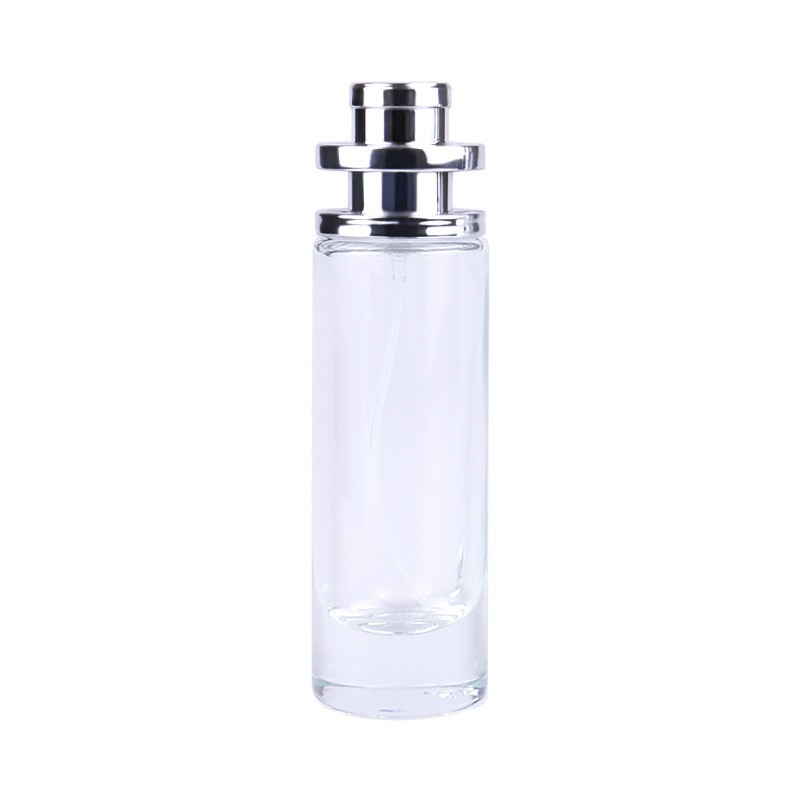 Cylindrical perfume bottle with pump spray bottle empty glass bottle