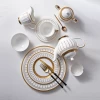 Excellent design dishwasher safe embossed floral artwork premium gold rim ceramic dinner plates sets royal bone china dinnerware