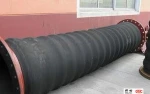 Flexible corrugated rubber hoses for oil