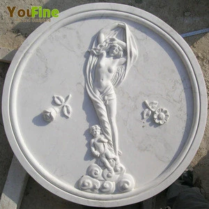 hand carved nude woman marble wall relief