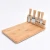 Import High Quality Useful Kitchen  4 Piece Stainless Steel  Knife Bamboo Cheese Board With Magnets from China