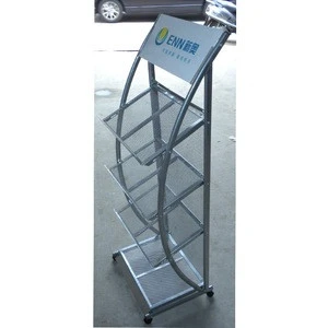 Metal rack display for books and Magazines,  Brochure holders in front of shops for reading.
