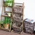 Import Modern home furniture wholesale cheap woven newspaper / books / magazine / flowers / sundries hanging baskets from China