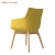 Import Modern new designer fabric cover leisure arm dining chair with wooden base from Hong Kong