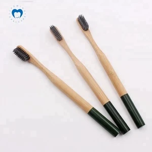 New style round shape bamboo wooden toothbrush with charcoal bristles