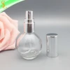 Screw closure small 15ml round ball shaped perfume bottle for women with pump silver lid cap