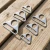 Import Custom Metal Triangle Buckle Strap Adjuster Strap Connector  for Handbag Webbing Hardware from Taiwan