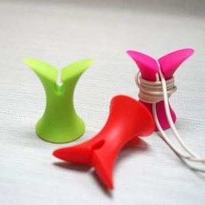 Hot sell fishtail silicone earphone cable winder/phone bracket