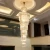 Import hotel large hang lamp gold k9 custom modern long pendant luxury staircase crystal chandelier light for living room high ceilings from Pakistan