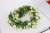 Import UV-resistant artificial wreath plastic flower link day garland for home decoration from China