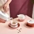 Import Wholesale exquisite Bone China Golden Handle Teacup Ceramic Tea Cups Saucers Sets from China