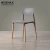 Import Wholesale high quality pp seat plastic chairs stacking leisure dining chairs with solid wood legs from China