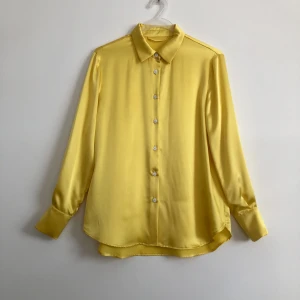 yellow silk soft and comfortable blouse