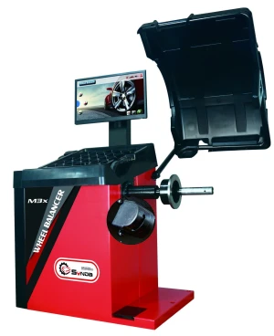 wheel balancer with pneumatic shaft