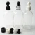 Import 150ML Clear Essential Oil Bottles Cosmetic Glass Bottles with Dropper from China
