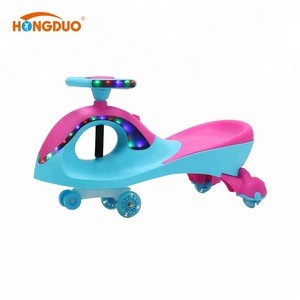 Cheap Plastic toy baby swing ride on car with music and light