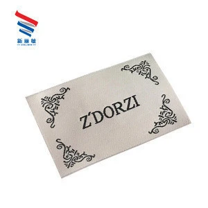 Custom brand logo wholesale black white popular embroidered high quality satin woven damask labels garment tag for clothing