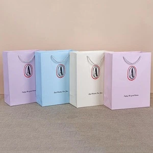 Custom logo printed luxury kraft paper shopping gift bag product