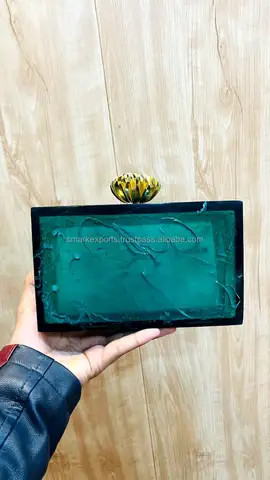 "Fashion Frost: Dark green Resin Clutch Purse with Diamond-like Embellishments - Stay Trendy and Elegant"