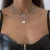 Import Fashion personality padlock geometric inlaid rhinestone alloy necklace set from China