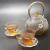 Import Hot sale handblown borosilicate glass teapot sets transparent glass teapot with infuser from China