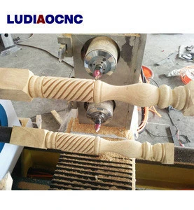 Jinan woodworking CNC wood turning lathe carving machine with spindle for staircase ,Rome column,baseball bat,chair legs