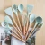 Import KU01 2021 High Quality Kitchen Accessories Tools Silicone Cooking Kitchen 11Pcs Wooden Utensils Sets With Logo from China