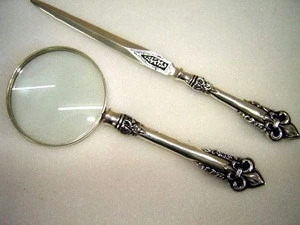 Magnifier with letter opener