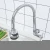 Import Modern Style Kitchen Faucets Chromium Plating Cross Handle Faucet Kitchen Sink Taps with S.S. soft spout from China