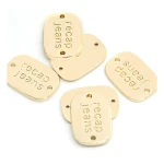 Round gold and gun metal alloy logo hang tags labels for jeans clothes