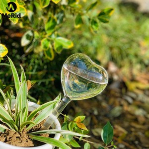 Wholesale hand-blown glass heart shape automatic plant waterer, automatic watering plant glass waterer